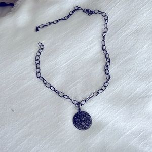 Black Diamond necklace on black/silver 20” chain.